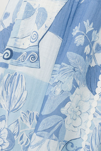 Close up of the blue and white vase and floral patchwork print fabric
