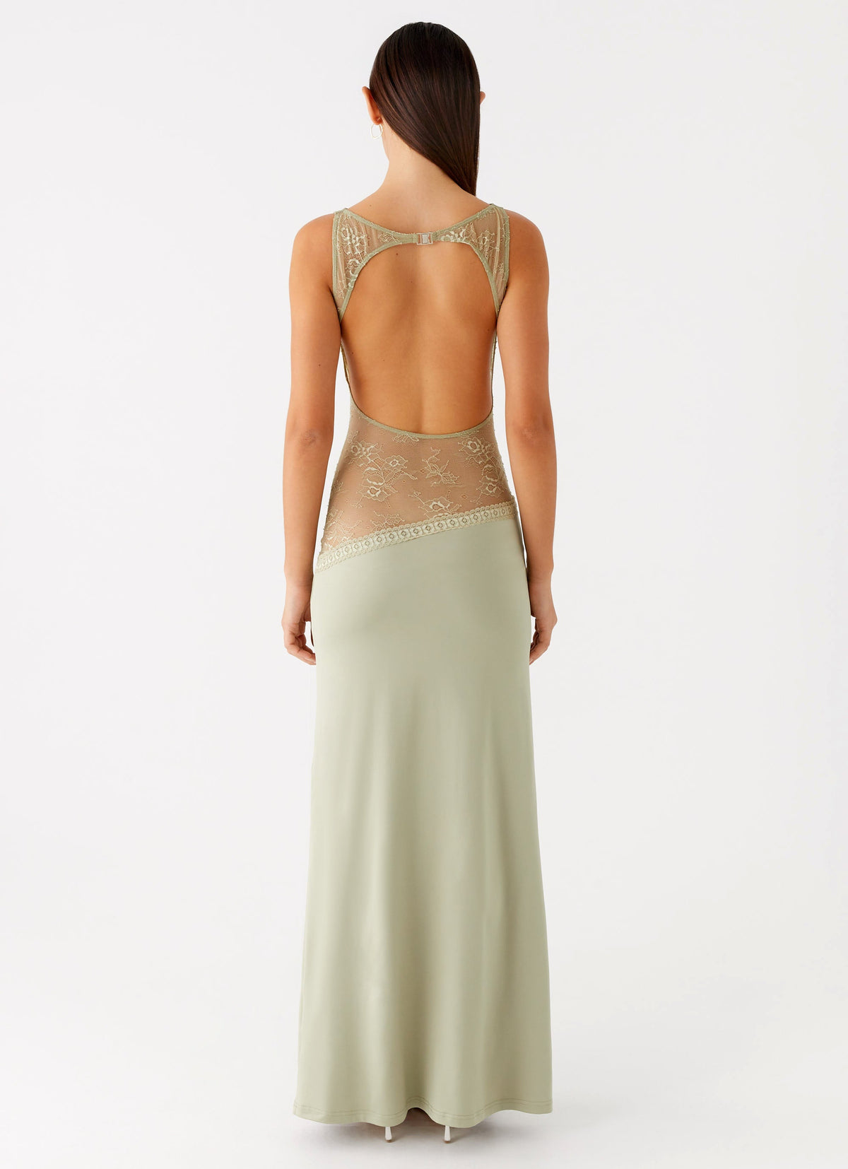 Back view of the sage maxi dress showing the lace-trimmed open back cut-out